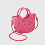 Woven straw bag back view with strap attachment