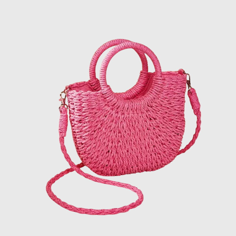Woven straw bag back view with strap attachment
