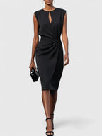 Flat lay product shot showing navy midi dress hemline and drape