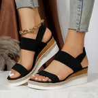 Close-up of textured navy elastic strap and platform sole detail