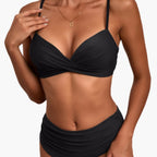 Model wearing cross front bikini top with adjustable shoulder straps, front view