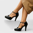 Rear view of ankle strap and raised platform sole construction