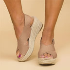 Women's cross strap espadrille wedge sandals in neutral tone, front view