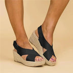 Woman walking in espadrille wedge sandals, outdoor setting