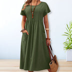 Women's pleated midi dress with short sleeves and round neckline, full-length front view