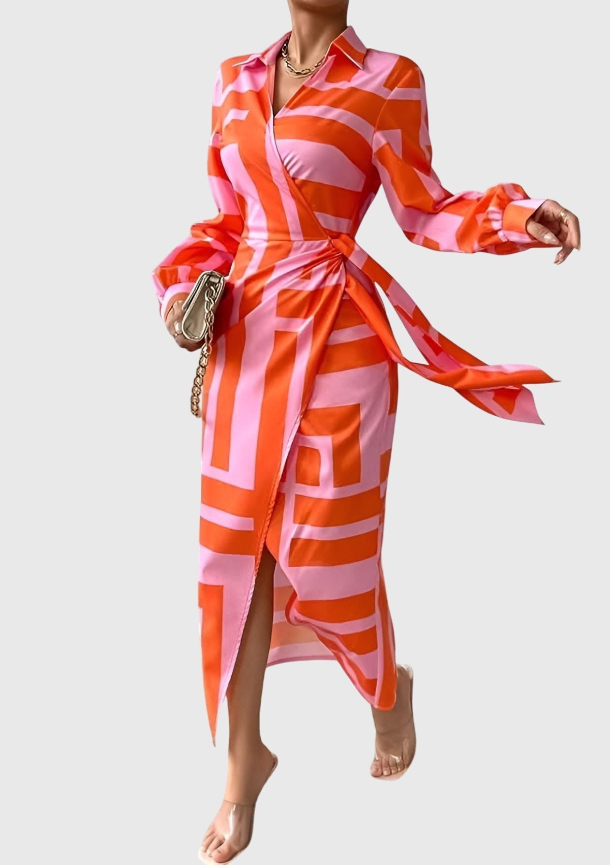 Women's geometric wrap maxi dress with orange and pink pattern, front view
