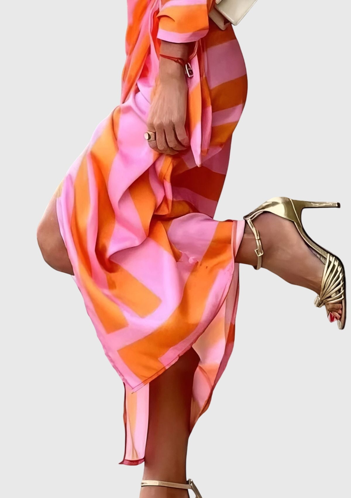 Side profile of geometric wrap maxi dress showing drape and silhouette