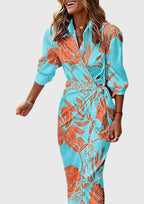 Full-length side view of geometric wrap dress on model