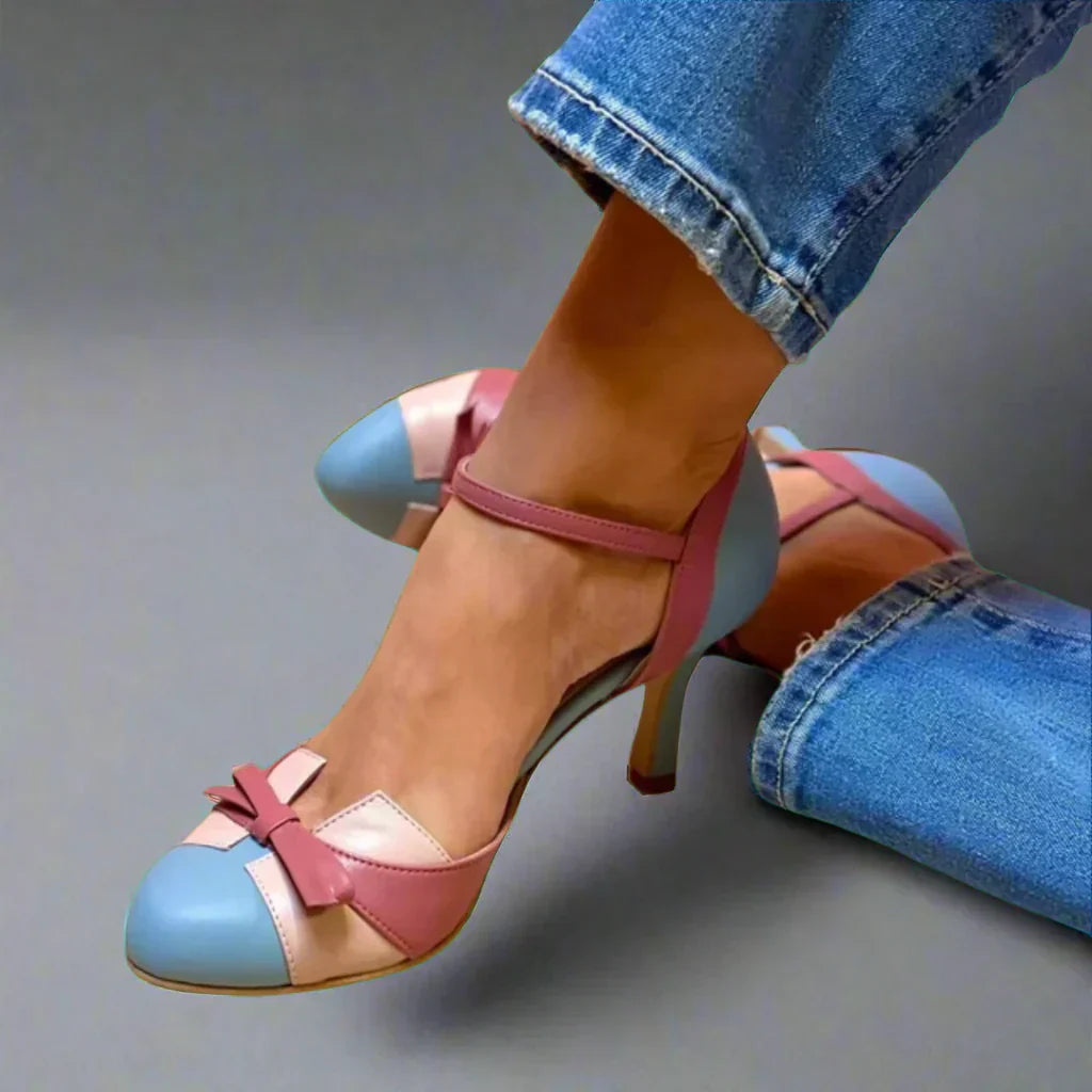 Pastel colour block mid heel pump with bow strap detail, side view