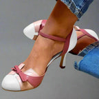 Close-up of delicate bow strap and colour block design on vamp