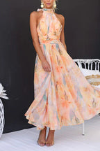 Close-up of watercolour print detail on maxi dress fabric