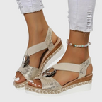 Woman posing in espadrille wedge sandals wearing summer outfit