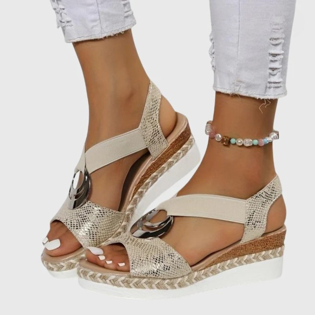 Woman posing in espadrille wedge sandals wearing summer outfit