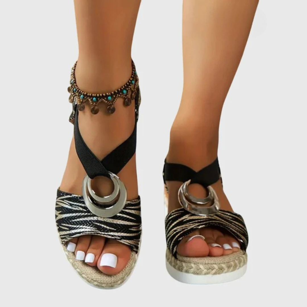 Front angle of sandal showing buckle and strap placement