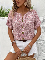 Back view of floral blouse showing relaxed silhouette and sleeve detail