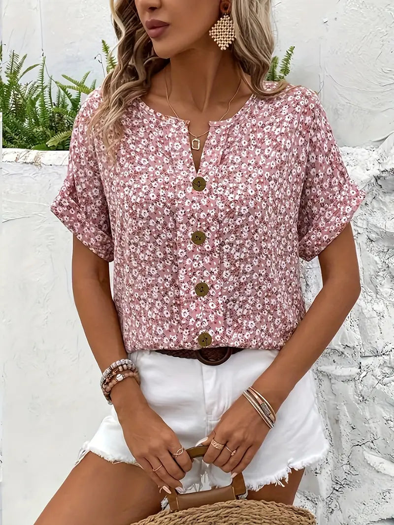 Back view of floral blouse showing relaxed silhouette and sleeve detail