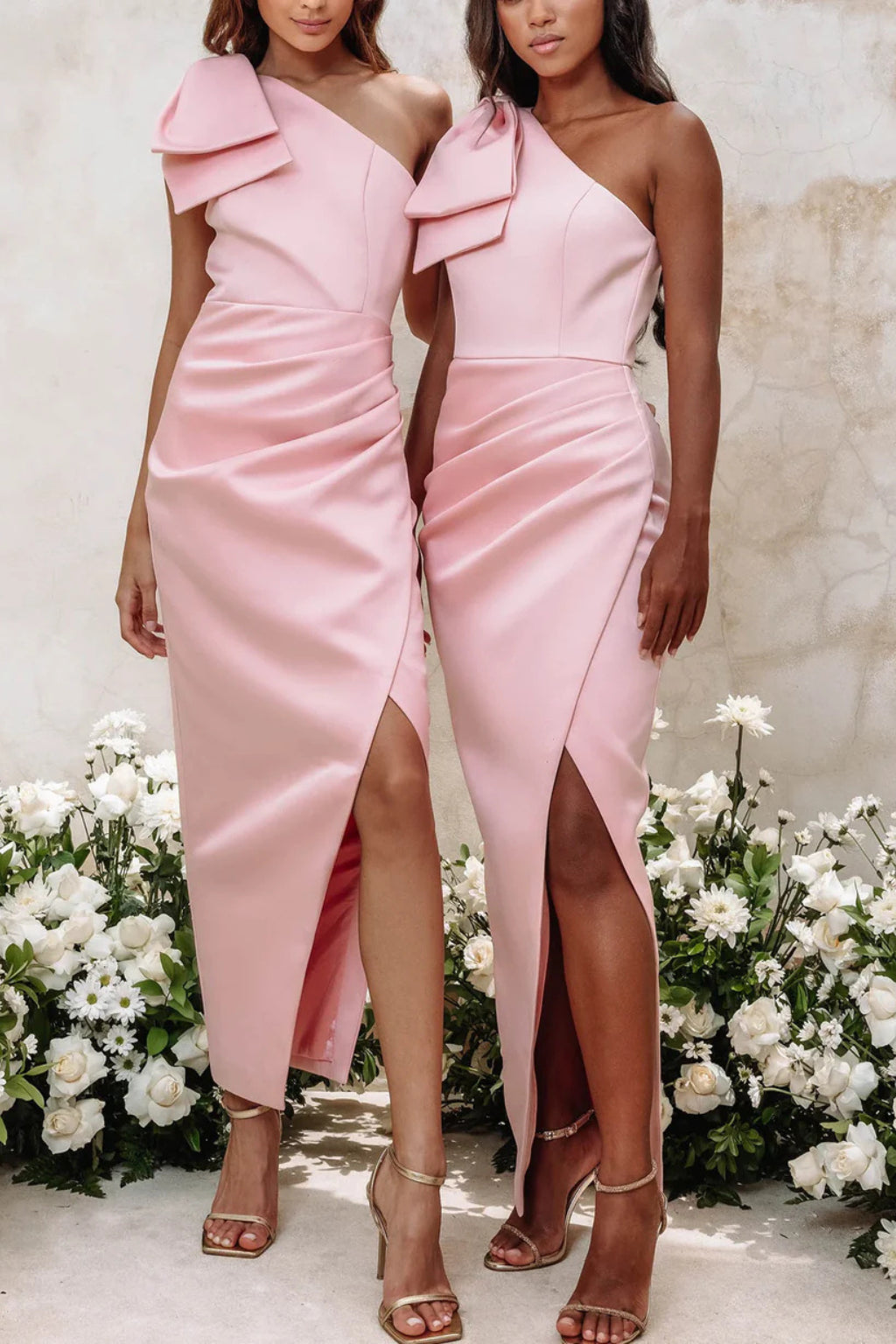 Rear view of pink maxi dress showing back neckline and draping