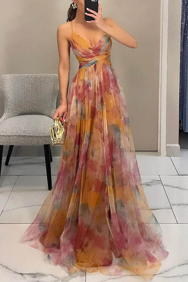 Back view of floral maxi dress showing adjustable straps and flowing skirt