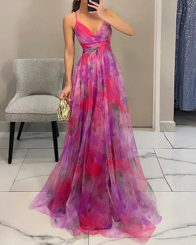 Model from behind wearing floral maxi dress, showing back strap placement