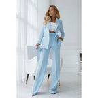 Powder blue double breasted blazer and wide leg trouser set, front view