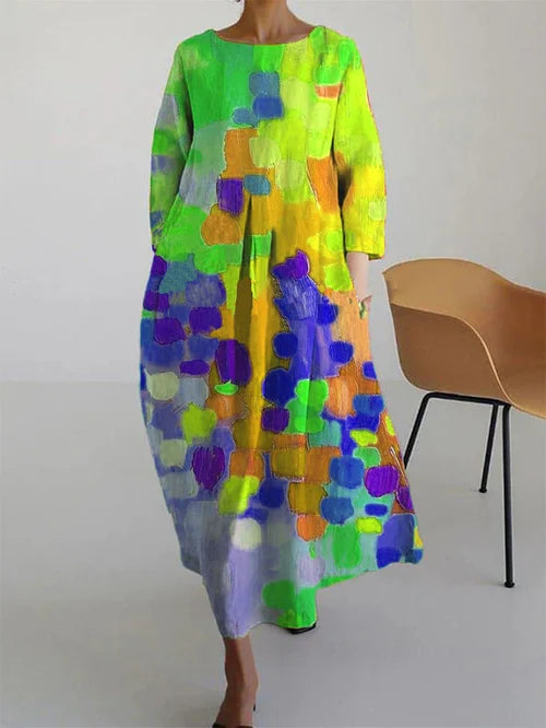 Model wearing abstract maxi dress, full-length side pose