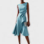 Back view of sleeveless midi dress with asymmetric design