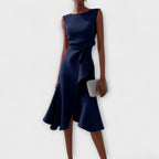 Close-up of asymmetric hemline and fluid fabric movement