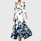 Close-up of red and blue floral print satin fabric and wrap bodice seam