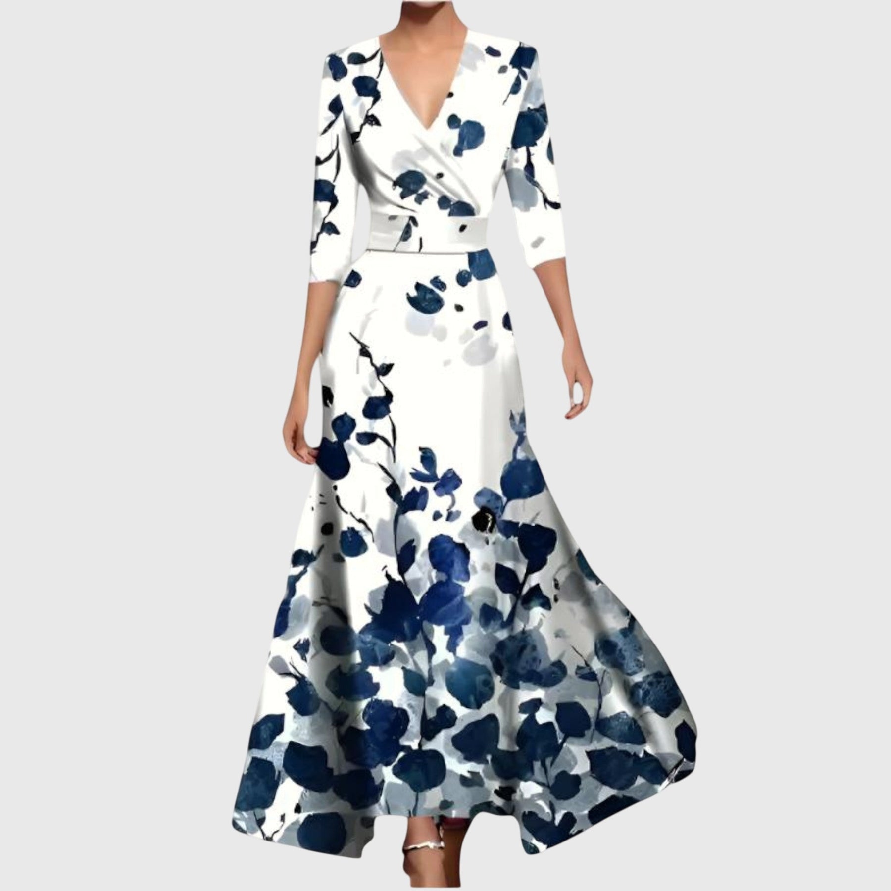 Back view of floral maxi dress showing 3/4 sleeve and flowing skirt