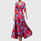 Women's floral wrap front maxi dress in red and blue print, full length view