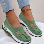 Women's knit slip-on sandals with memory foam cushioning, front and side view