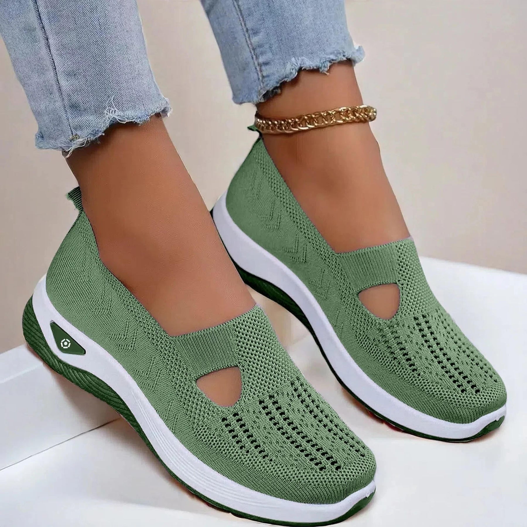 Women's knit slip-on sandals with memory foam cushioning, front and side view