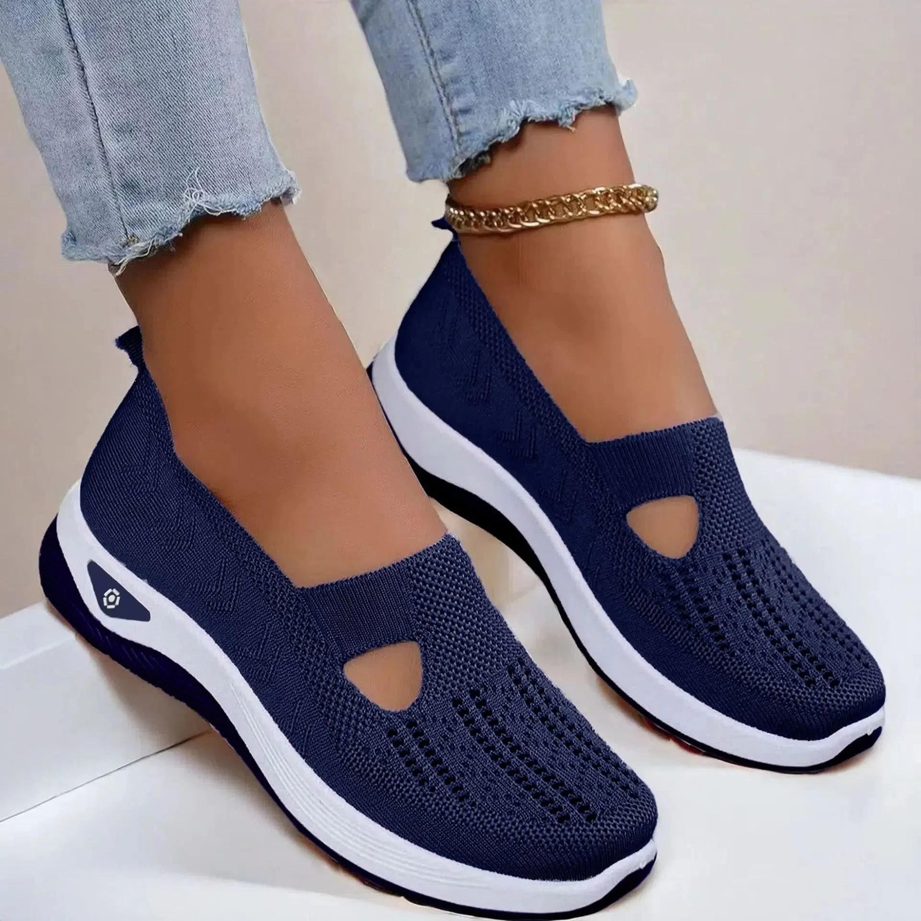 Side profile of sandal highlighting arch support and sole construction