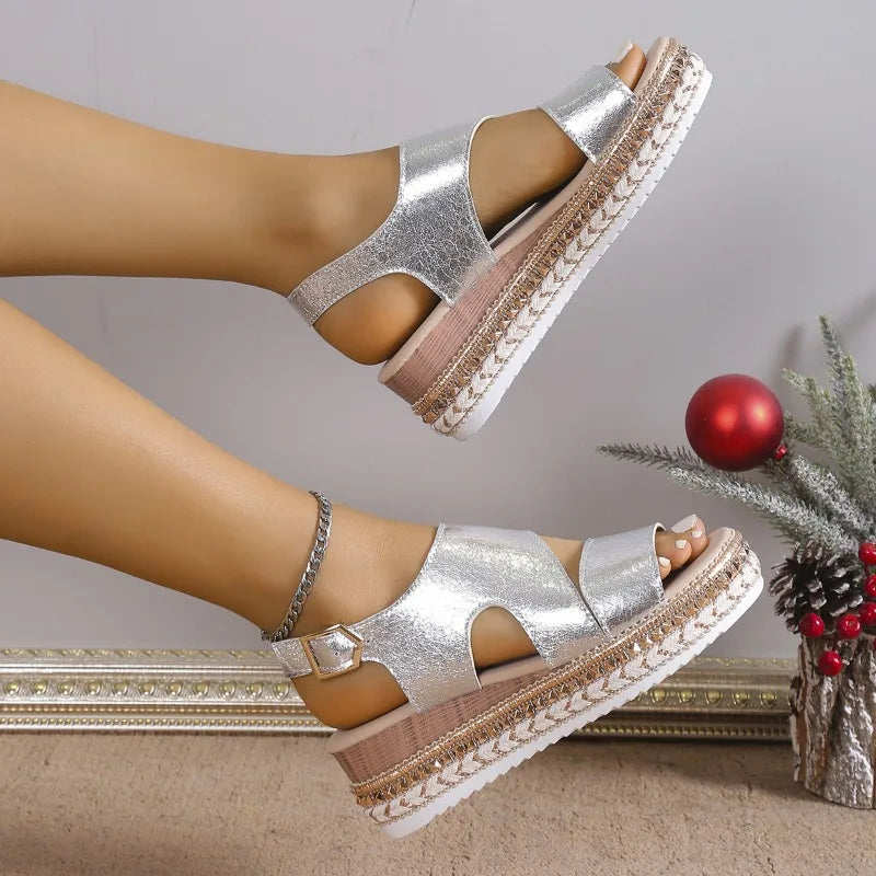 Close-up of metallic finish and adjustable ankle strap detail