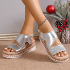Overhead view of sandals showing cutout design and espadrille sole