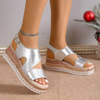 Silver metallic platform sandals with ankle strap, front and side view