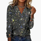 Close-up detail of sequin embellishment and long sleeve cuff