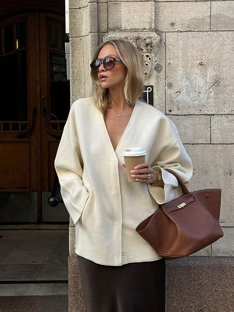 Tote bag styled with casual outfit, posed shot