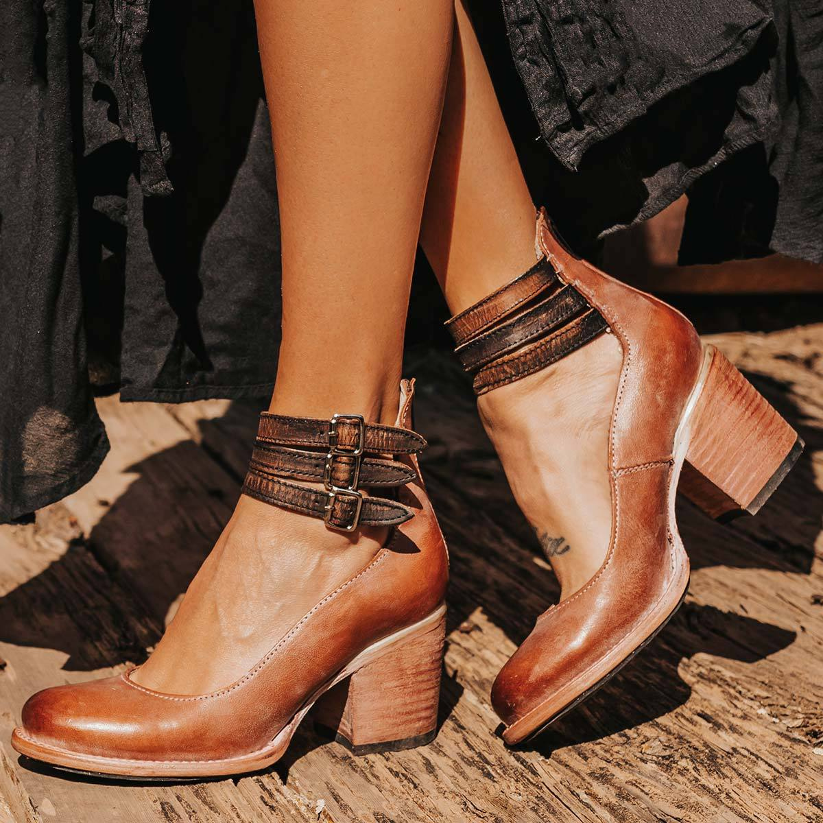 Top-down view showing natural grain leather finish and buckle placement