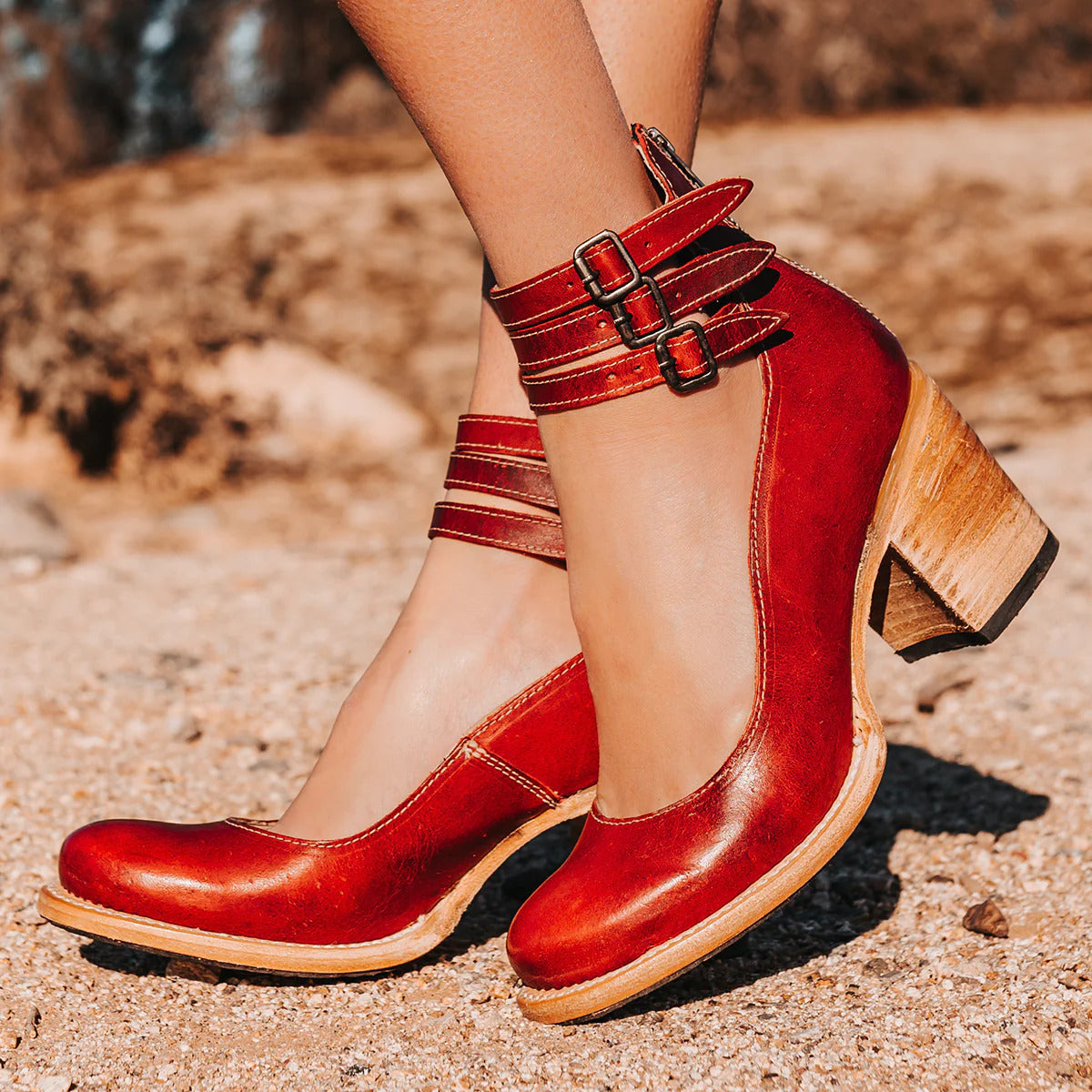 Back view of boots displaying heel construction and upper leather
