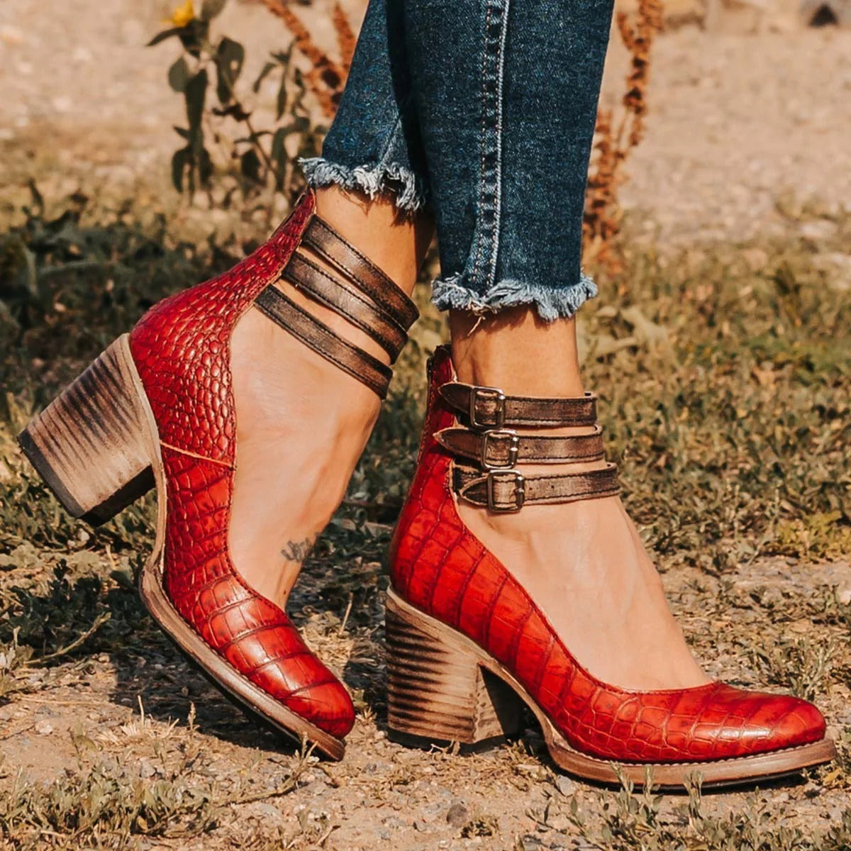 Walking pose displaying boots in action with block heel