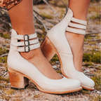 Close-up of dual adjustable buckle straps on boot shaft