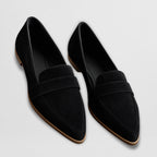 Close-up detail of soft suede texture and cushioned insole construction