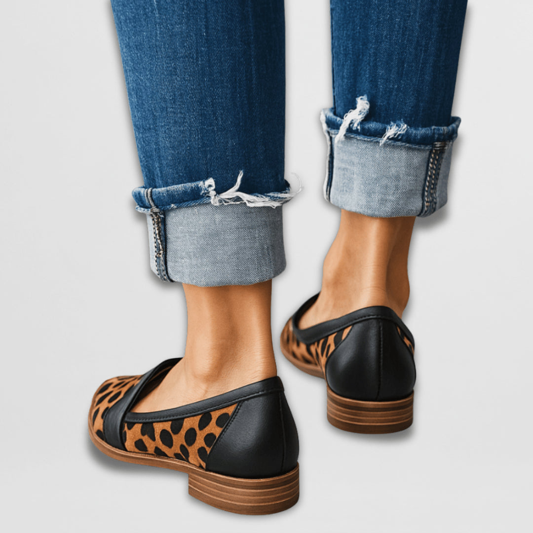 Woman standing in suede loafers, full outfit view demonstrating versatile everyday wear