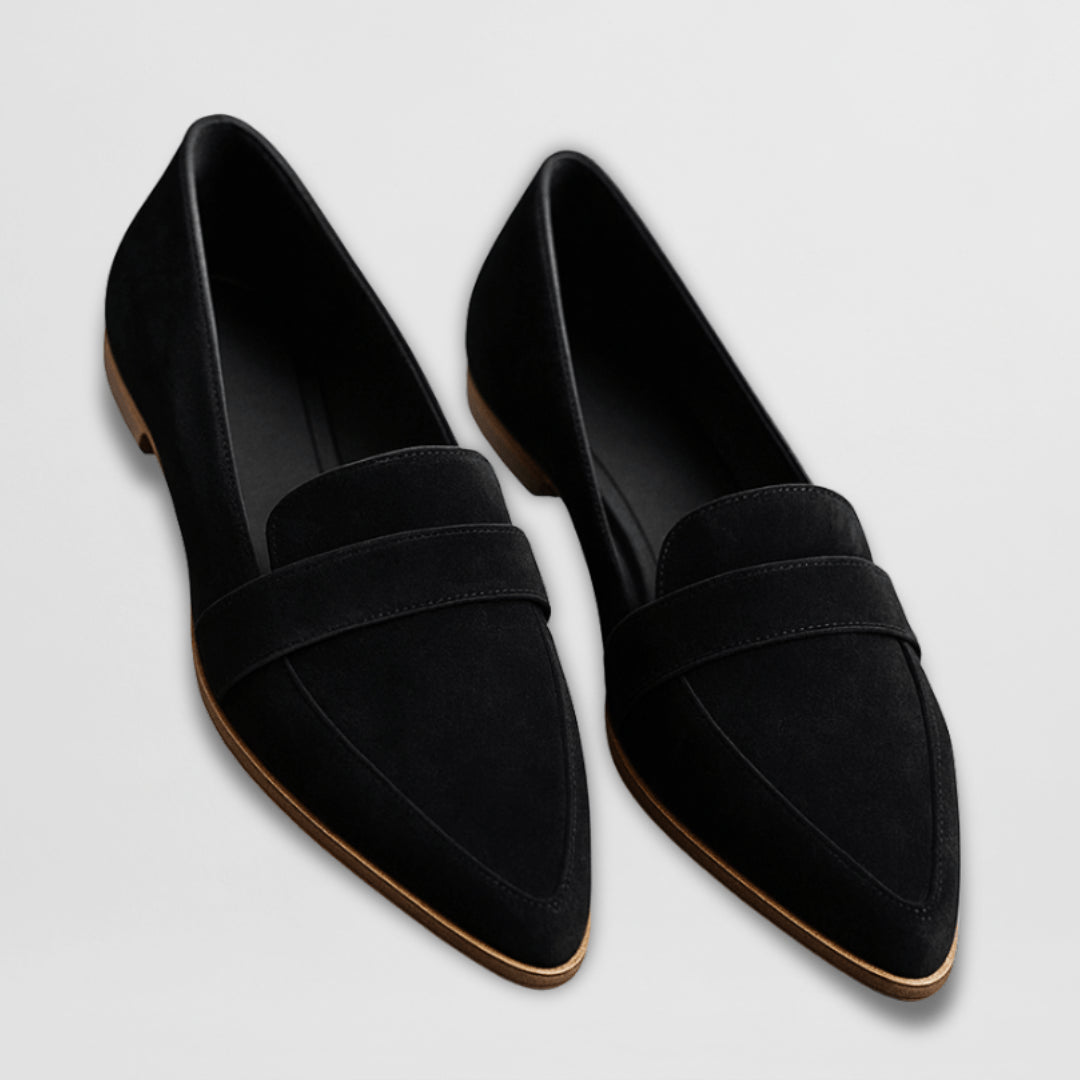 Close-up detail of soft suede upper texture and loafer stitching