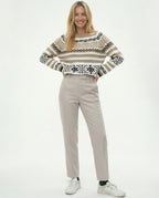 Waistband and zip detail on herringbone trousers