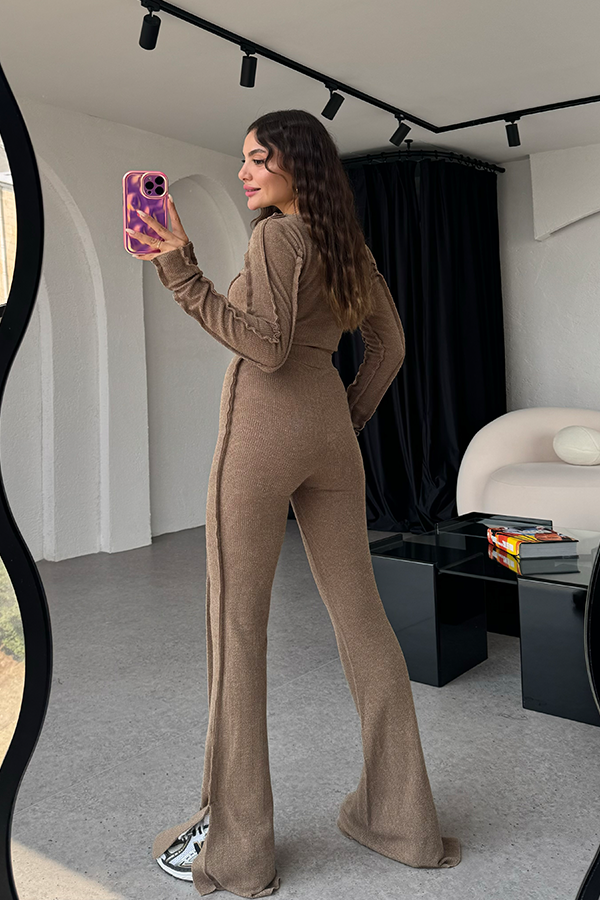 Model posing in full set showing overall coordinated look and proportions