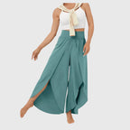 Teal wide leg trousers with split hem, front view on model