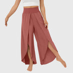 Full-length view of teal trousers on model, front facing