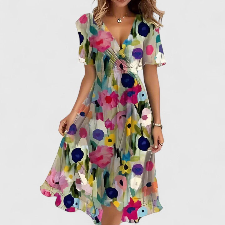 Side profile showing fitted waist and high-low hem detail